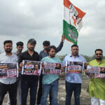 भोपाल में पानी की टंकी पर चढ़े युवा कांग्रेस कार्यकर्ता, मांगा अमित शाह का इस्तीफा